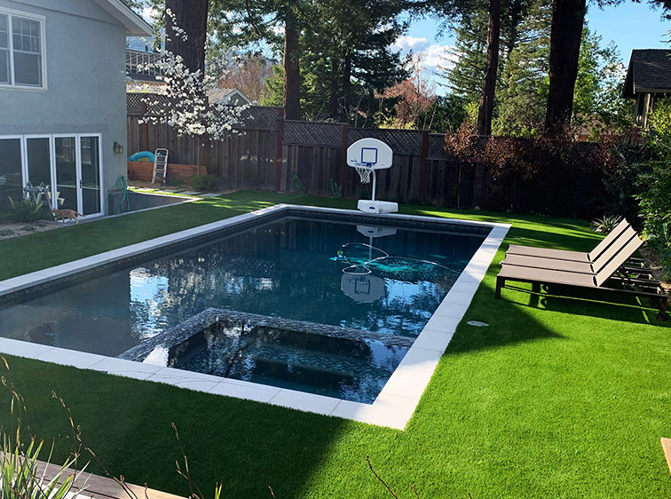 Is Synthetic Grass in Santa Rosa a Better Choice Than Natural Grass for a Pool Area?