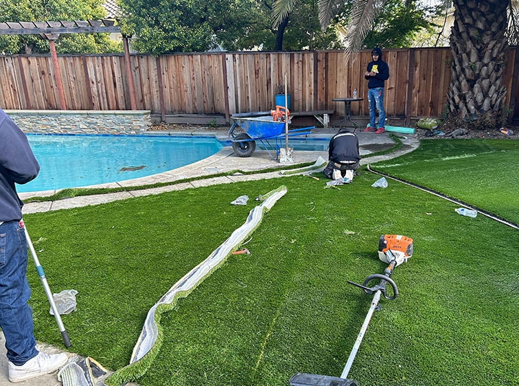 Want to Hire Pros to Install Synthetic Grass in Stockton Around Your Pool? Consider These Factors