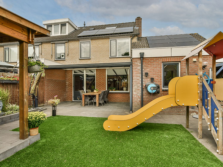 How Does Artificial Grass Compare to Traditional Playground Surfaces?